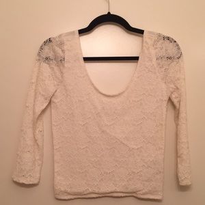 Dressy crop top with labels still attached.